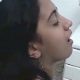 A pretty Brazilian girl takes a heaping shit on a plate, sniffs her shit, and then farts loudly several times.